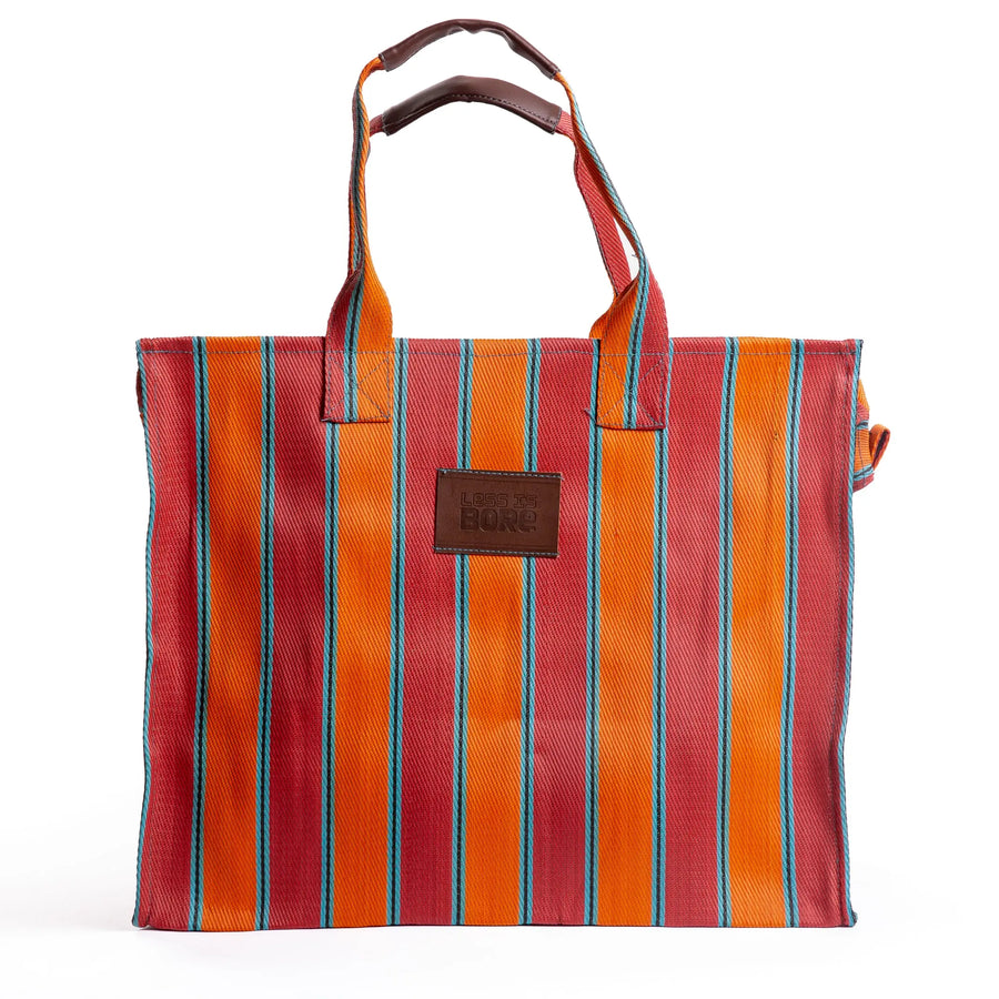 Explorer bag in brick and blaze colors, made of recycled nylon, from Less is Bore