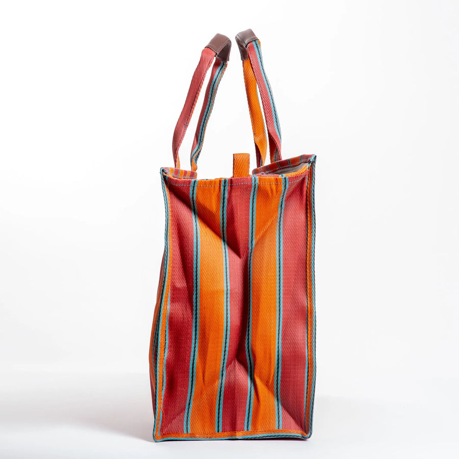 Explorer bag in brick and blaze colors, made of recycled nylon, from Less is Bore