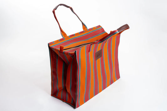 Explorer bag in brick and blaze colors, made of recycled nylon, from Less is Bore