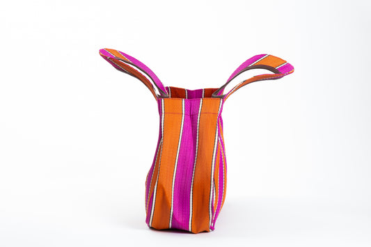 Fidget bag in Blush & Burn colors, made of recycled nylon, from Less is Bore